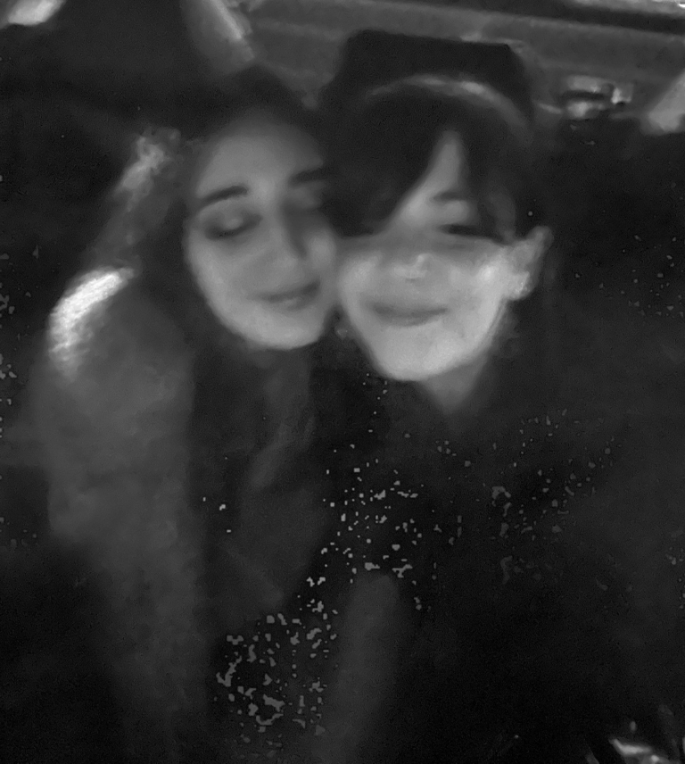 Black and white photo of the two artists together.